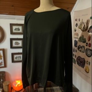 Green long sleeve Under Armour shirt with criss cross back and thumb holes